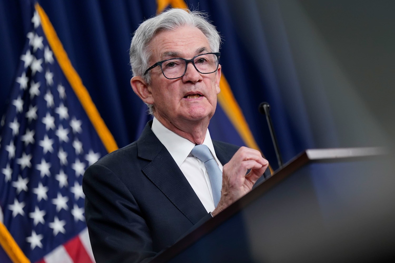 Powell at Jackson Hole podium — close, serious expression