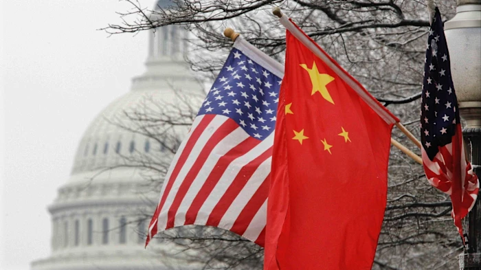 Chinese flag detail representing US-China technology competition.